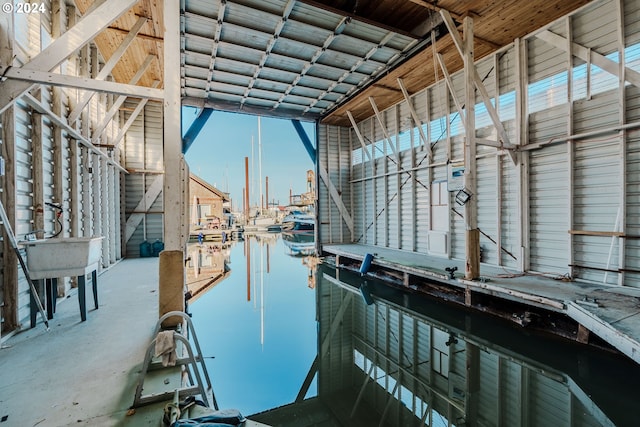 dock area featuring a water view