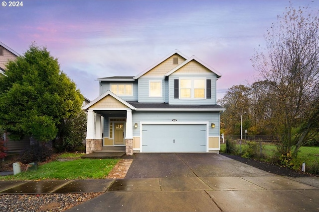 craftsman inspired home with a garage