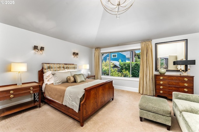 bedroom featuring light colored carpet, baseboards, and vaulted ceiling