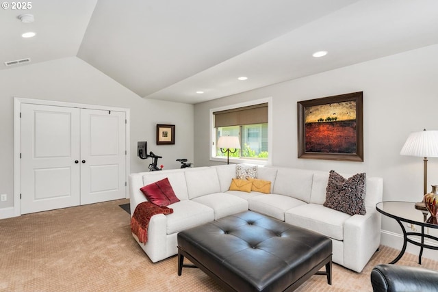 living area featuring visible vents, baseboards, lofted ceiling, light carpet, and recessed lighting