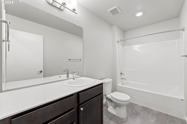 full bathroom with vanity, toilet, shower / washtub combination, and hardwood / wood-style flooring