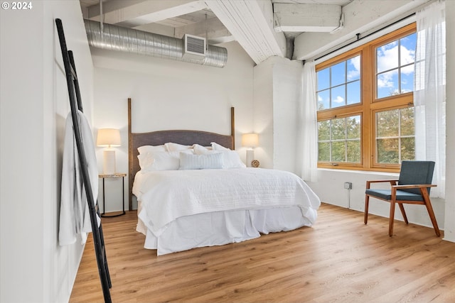 bedroom featuring light hardwood / wood-style floors