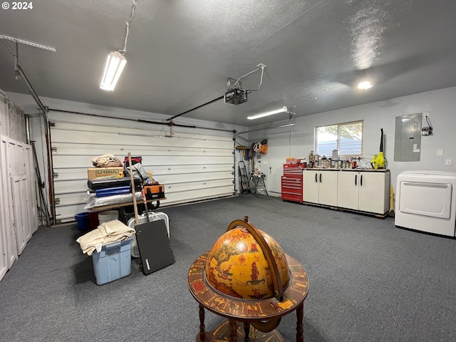 garage featuring a garage door opener and washing machine and clothes dryer