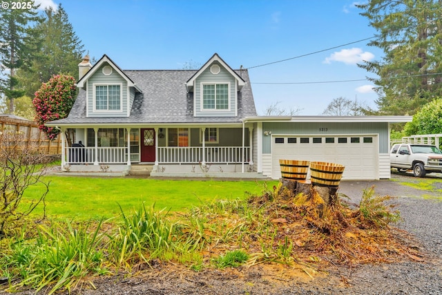 5213 Hilltop Dr, Florence, OR 97439 - view of front of home with a porch, roof with shingles, a chimney, an attached garage, and driveway