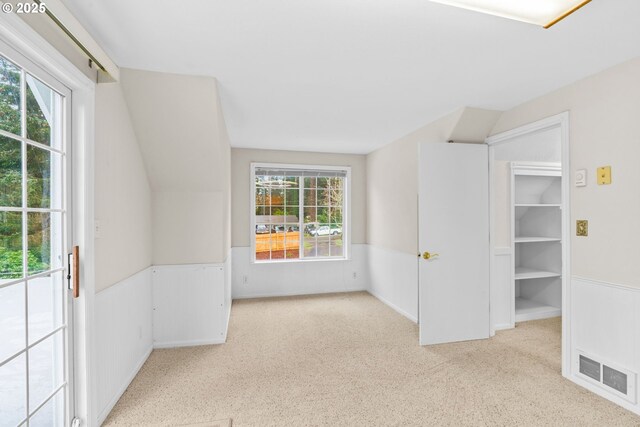 5213 Hilltop Dr, Florence, OR 97439 - bonus room with carpet floors, wainscoting, and plenty of natural light