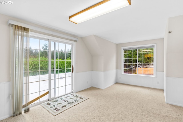 5213 Hilltop Dr, Florence, OR 97439 - bonus room featuring wainscoting, lofted ceiling, and carpet flooring