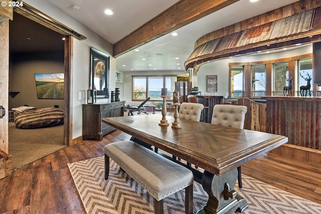 dining space with hardwood / wood-style flooring