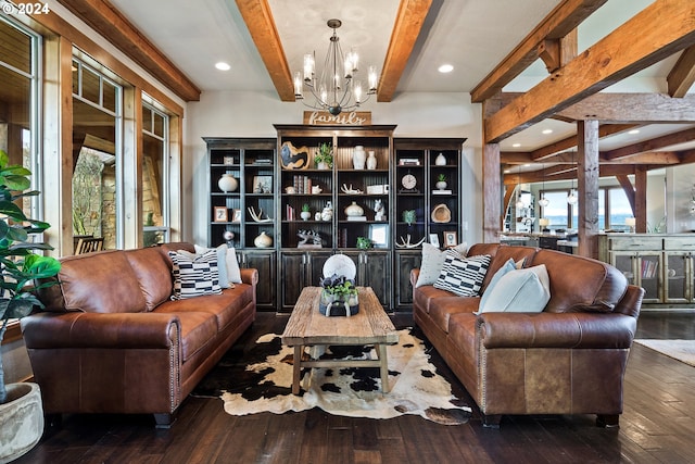 living room with a chandelier, beam ceiling, and dark hardwood / wood-style floors