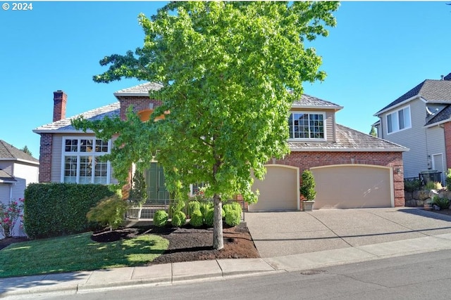 view of front of property with a garage