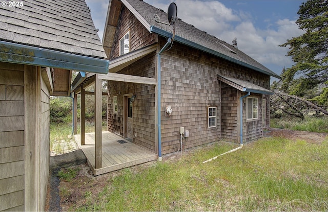 34540 Nestucca Blvd, Cloverdale, OR 97112 - view of side of property featuring a shingled roof and a yard