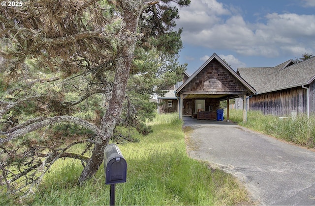 34540 Nestucca Blvd, Cloverdale, OR 97112 - view of front of house featuring asphalt driveway and a carport