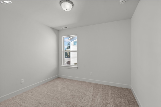 empty room featuring carpet flooring