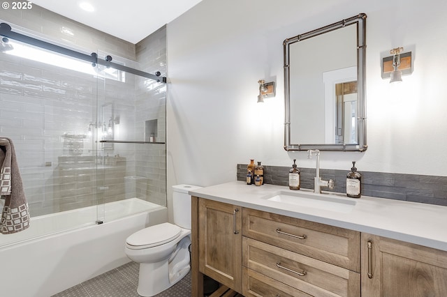 bathroom featuring toilet, vanity, enclosed tub / shower combo, and tile patterned floors