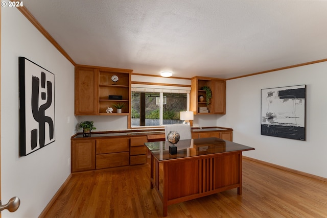 home office with crown molding, wood-type flooring, and a textured ceiling