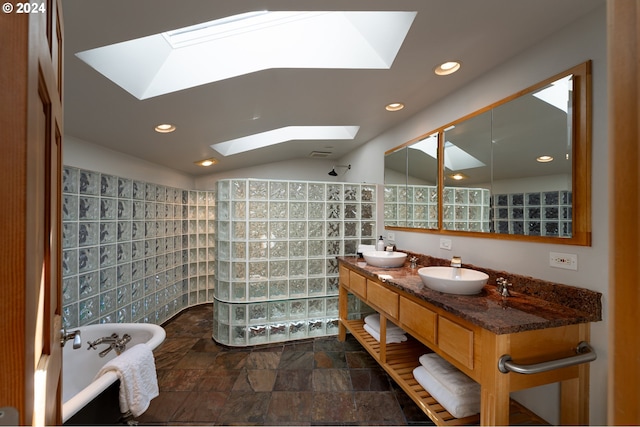 bathroom with lofted ceiling, shower with separate bathtub, and vanity