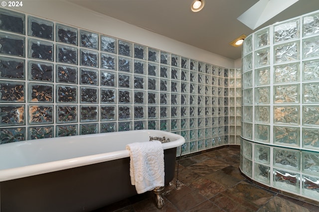 bathroom featuring a skylight