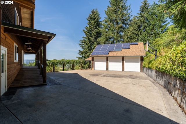 garage featuring solar panels