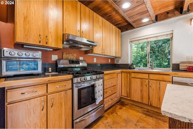 kitchen with beamed ceiling, stainless steel range with gas cooktop, sink, extractor fan, and wooden ceiling