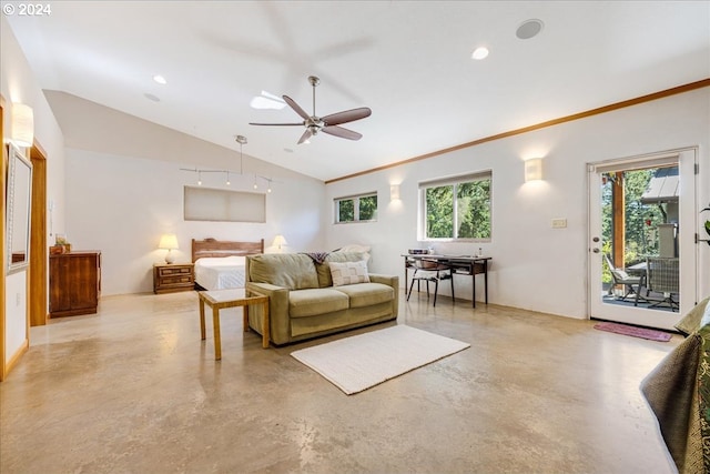 bedroom featuring ornamental molding, vaulted ceiling, multiple windows, and access to exterior