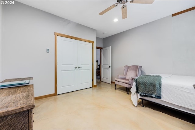 bedroom featuring ceiling fan and a closet