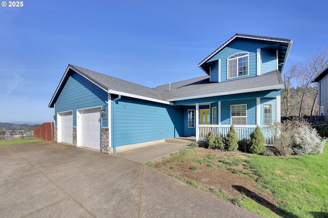 870 Kristen Way, Cottage Grove, OR 97424 - view of front of property featuring an attached garage, covered porch, and driveway