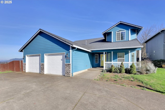 870 Kristen Way, Cottage Grove, OR 97424 - view of front of property featuring roof with shingles, a porch, concrete driveway, a garage, and stone siding