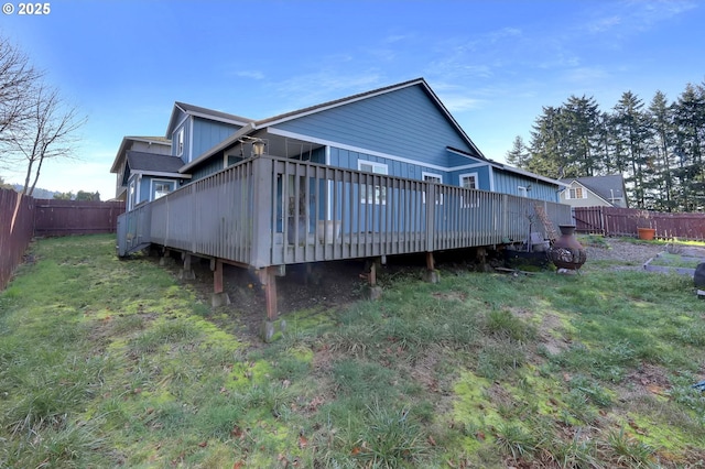 870 Kristen Way, Cottage Grove, OR 97424 - rear view of house featuring a yard, a wooden deck, and a fenced backyard