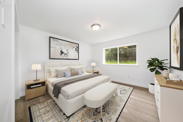 bedroom featuring light hardwood / wood-style floors