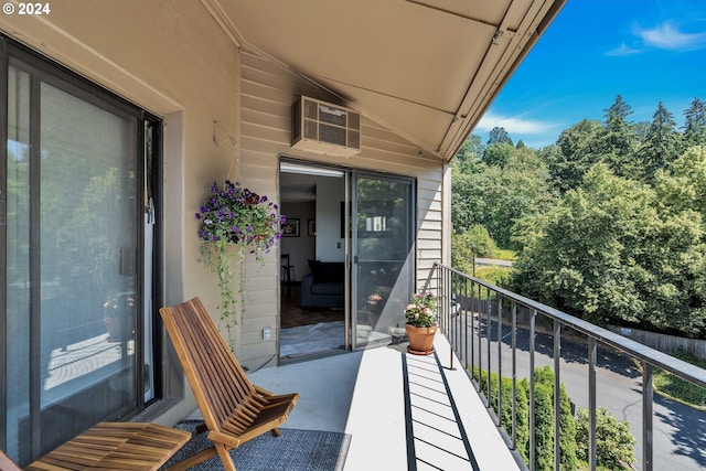 balcony featuring a wall mounted air conditioner