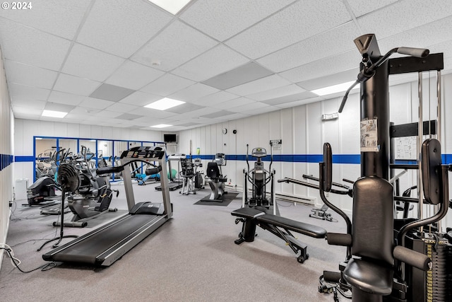 gym featuring a drop ceiling