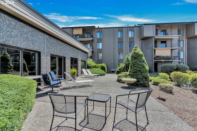 view of patio with a balcony