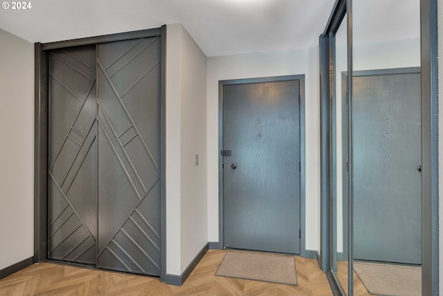 interior space with light parquet floors