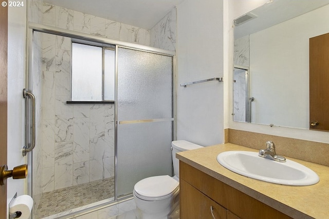 bathroom with walk in shower, toilet, tile patterned floors, and vanity