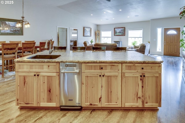 191 SW 67th St, Redmond, OR 97756 - kitchen featuring plenty of natural light, light brown cabinetry, light wood-type flooring, a sink, and open floor plan