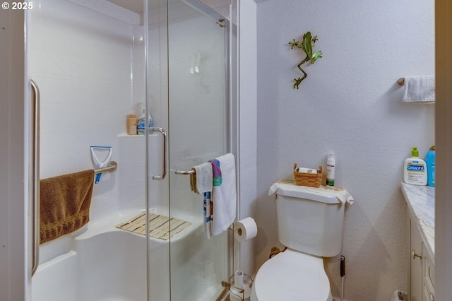 191 SW 67th St, Redmond, OR 97756 - bathroom with vanity, toilet, and a stall shower