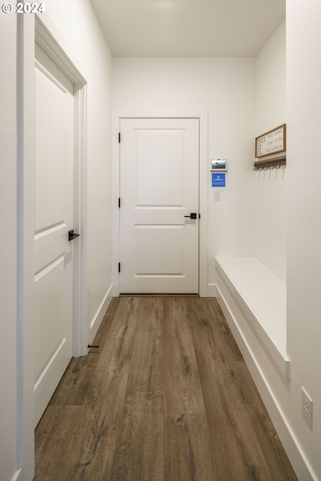 doorway featuring dark hardwood / wood-style floors