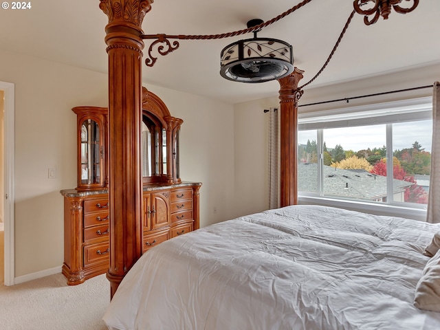 bedroom with light carpet