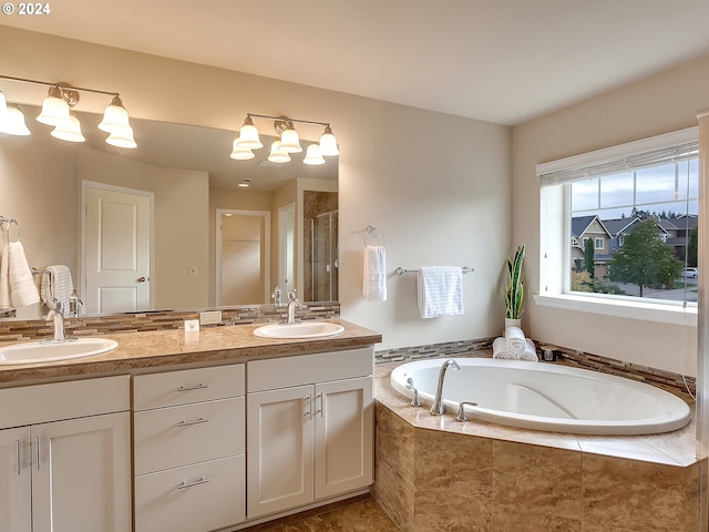 bathroom with vanity and plus walk in shower