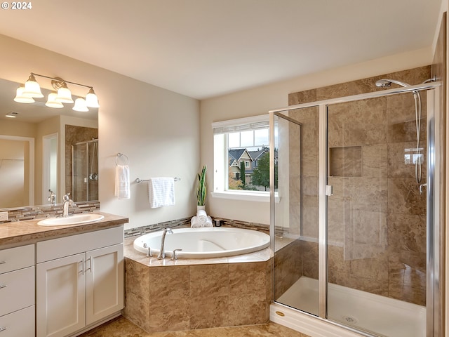 bathroom with vanity, plus walk in shower, and tile patterned floors