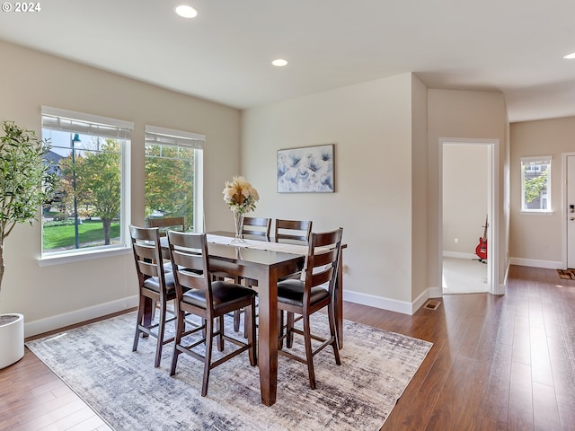 dining room featuring dark hardwood / wood-style flooring