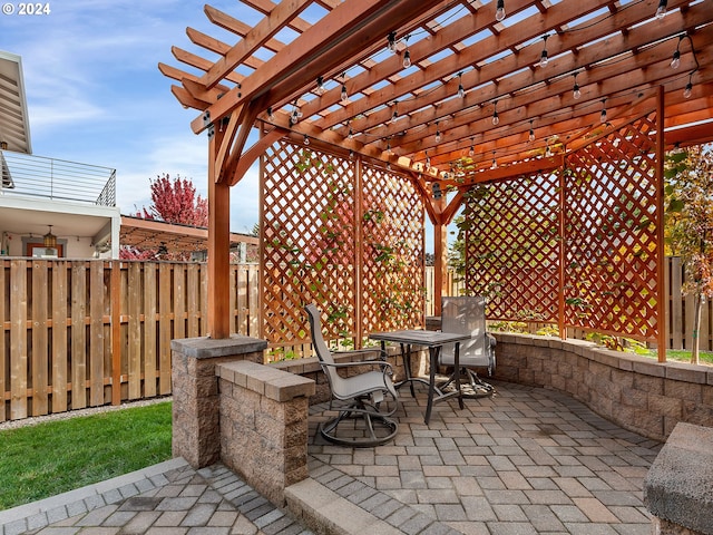 view of patio featuring a pergola