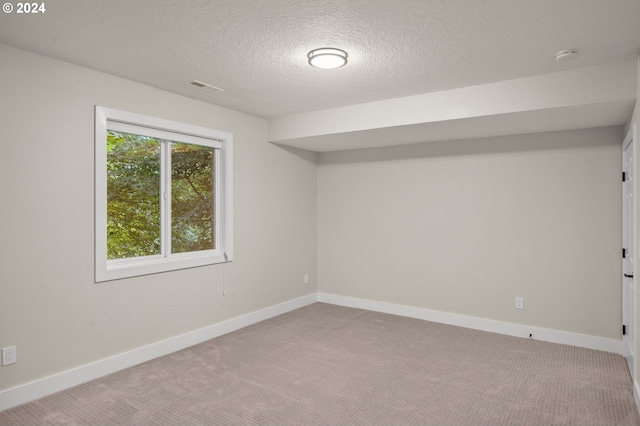 interior space with a textured ceiling