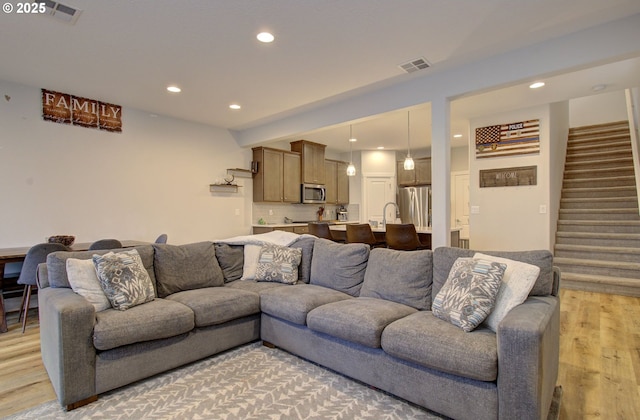 living room featuring light wood-type flooring