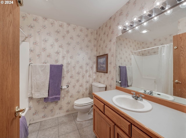 bathroom featuring tile patterned floors, toilet, a shower with shower curtain, and vanity