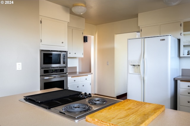 kitchen with white cabinets and stainless steel appliances