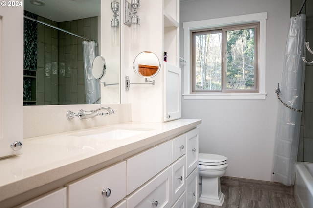 full bathroom featuring vanity, toilet, and shower / bathtub combination with curtain