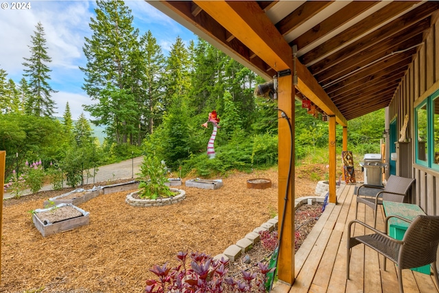 view of yard featuring a deck