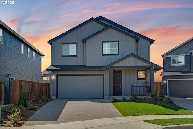 traditional home with fence, an attached garage, board and batten siding, driveway, and covered porch