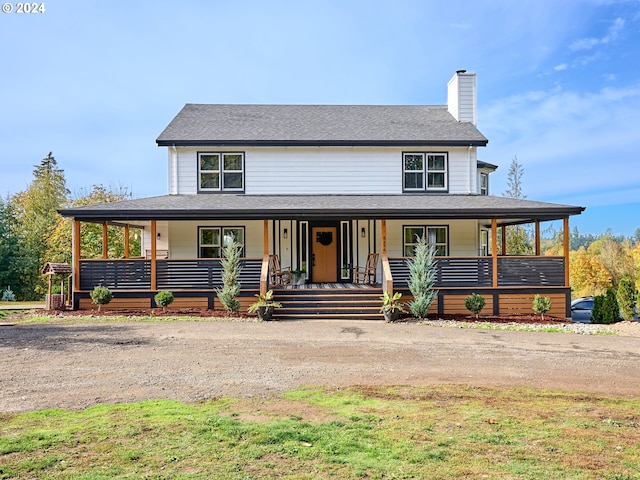 farmhouse with a porch