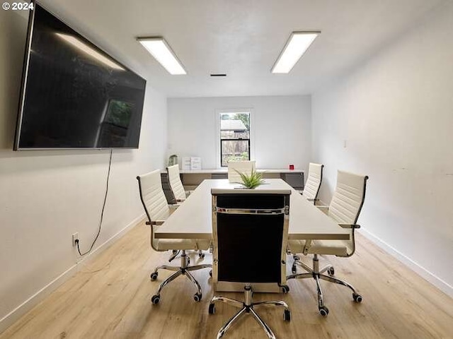 office area featuring wood finished floors and baseboards